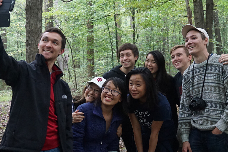 Selfie in the woods with students